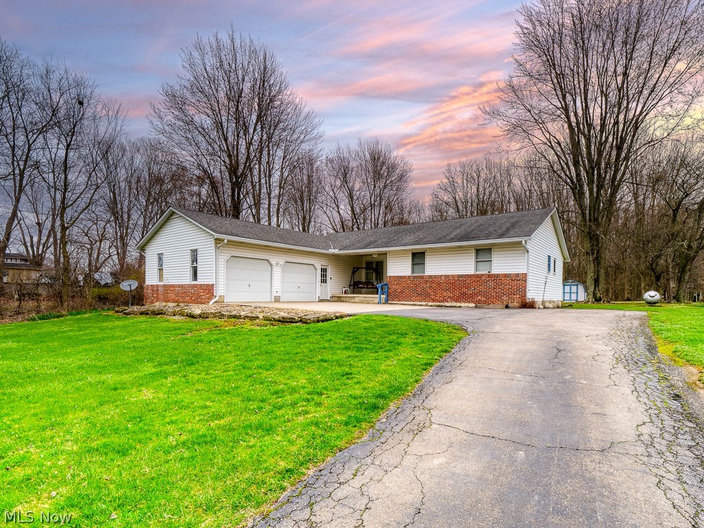 5175 Case Road North Ridgeville, OH 44039 - Photo 2 of 28 Single story home with a yard and a garage