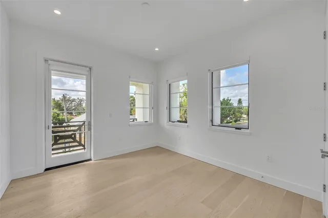 an empty room with windows