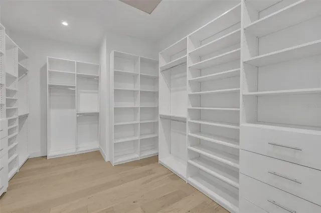 a view of an empty walk in closet