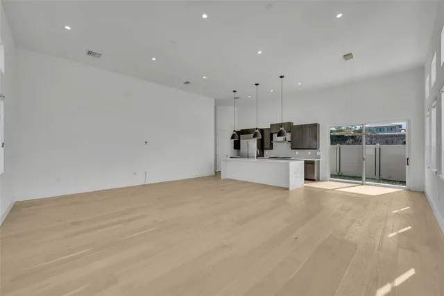 a view of a kitchen with a sink