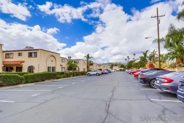 a view of a car is parked in front of a house