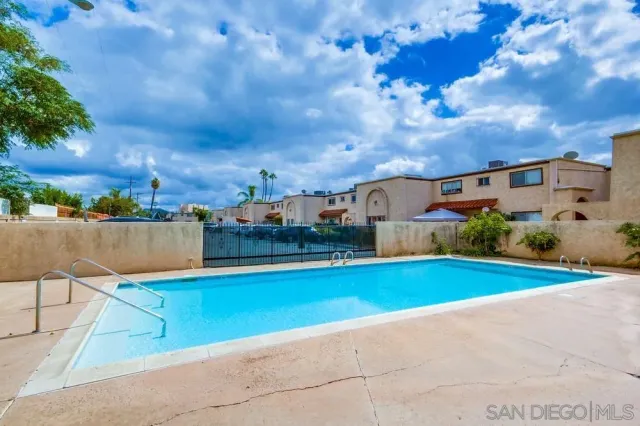 a view of a playground with houses