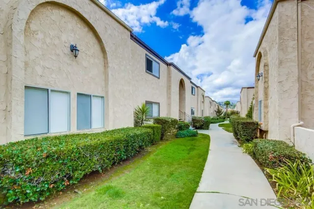 a view of a back yard of the house