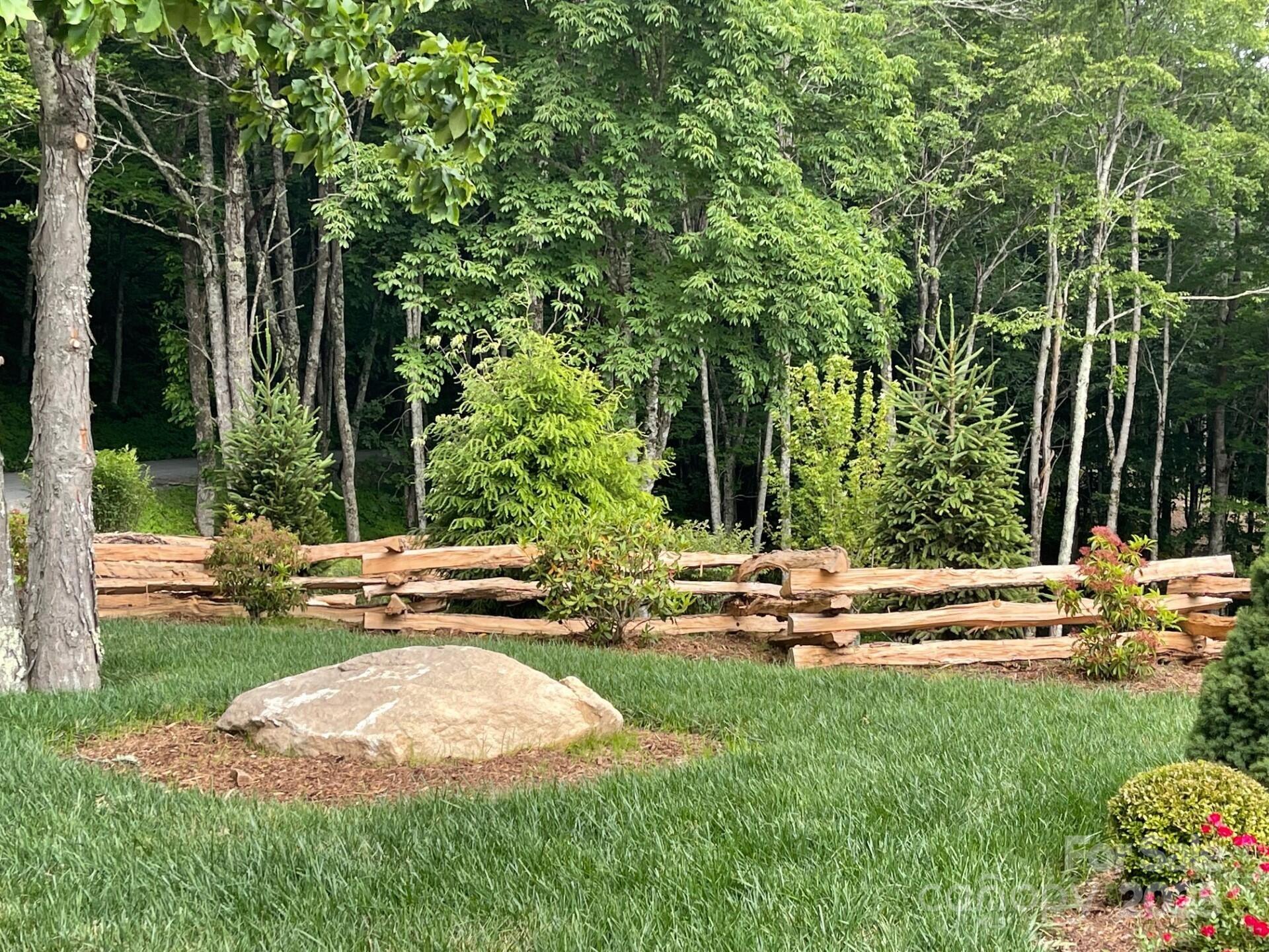 0 Lee Gualtney Road, Unit 15 Apex, NC 27523 - Photo 8 of 15 a view of a house with backyard and sitting area