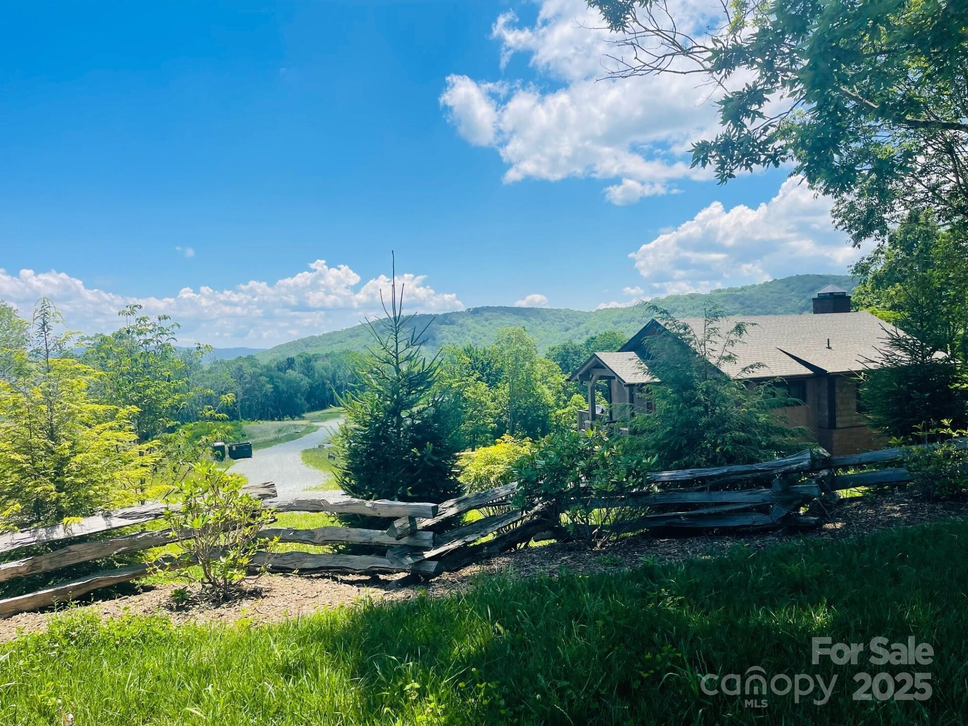 0 Lee Gualtney Road, Unit 15 Apex, NC 27523 - Photo 10 of 15 a view of a house with a yard