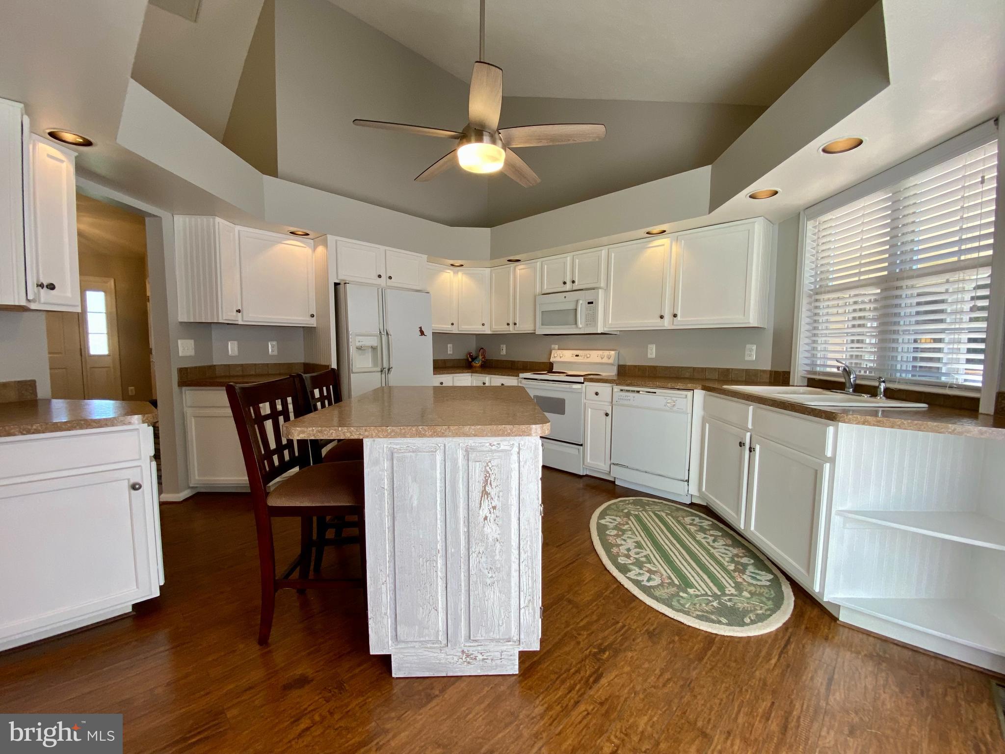 210 Canyon Road Winchester, VA 22602 - Photo 11 of 27 Kitchen with Sliding Glass Doors to 43 x 13 Deck