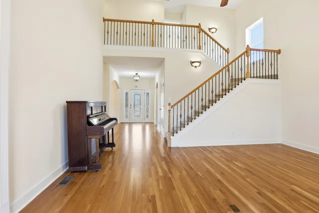 a view of entryway with wooden floor