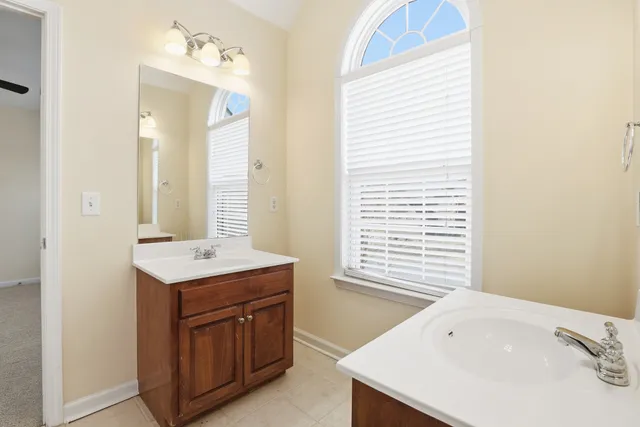 a bathroom with a sink and a bathtub