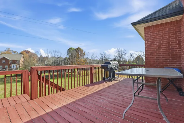 a view of a balcony with chairs
