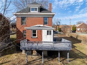 9600 Frankstown Road Pittsburgh, PA 15235 - Photo 23 of 28 a view of a house with a roof deck