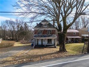 9600 Frankstown Road Pittsburgh, PA 15235 - Photo 25 of 28 a view of a house with a yard