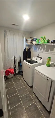 a bathroom with a sink and a toilet