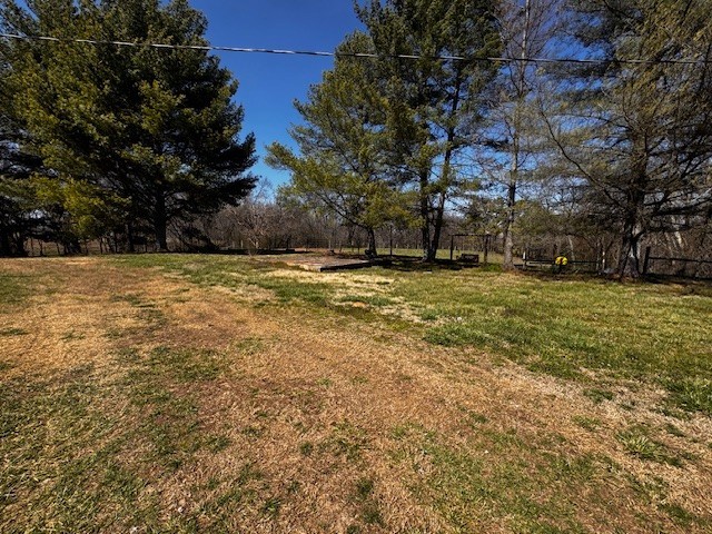 442 Shady Grove Road Flintville, TN 37335 - Photo 30 of 44 a view of a field with an trees