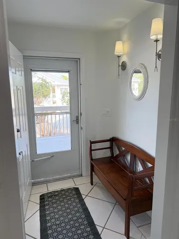 a room with window and mirror