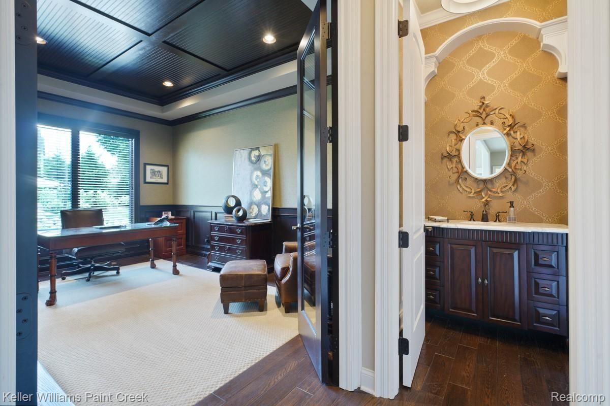 2777 South Addison Circle Rochester, MI 48306 - Photo 43 of 85 View of Library with double doors and entry to Formal Powder Room