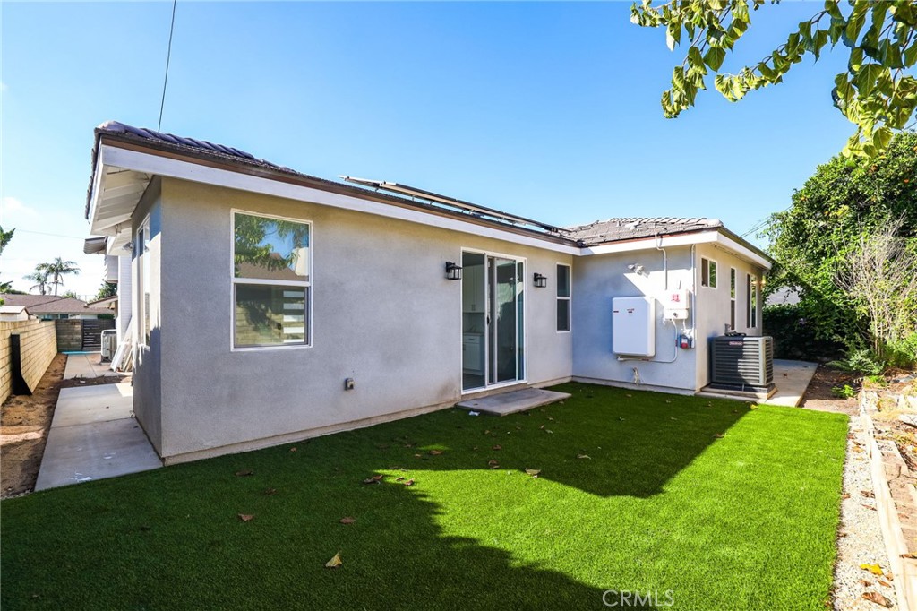 11875 Wisteria Avenue, Unit ADU Fountain Valley, CA 92708 - Photo 1 of 14 a view of house with backyard