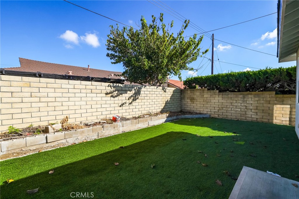 11875 Wisteria Avenue, Unit ADU Fountain Valley, CA 92708 - Photo 14 of 14 a view of a lake with a yard