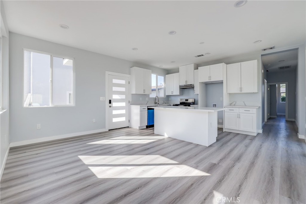 11875 Wisteria Avenue, Unit ADU Fountain Valley, CA 92708 - Photo 3 of 14 a view of kitchen with wooden floor and window