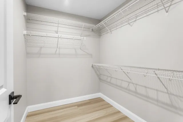 a view of a room with racks on the wall