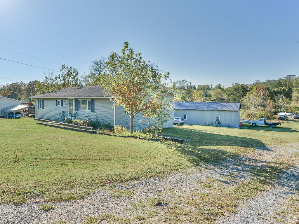 369 Miller Road Telford, TN 37690 - Photo 3 of 36 Right side of home