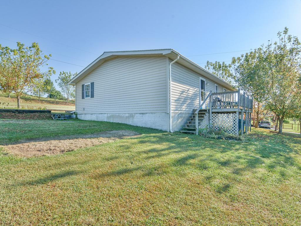 369 Miller Road Telford, TN 37690 - Photo 4 of 36 Right side of home