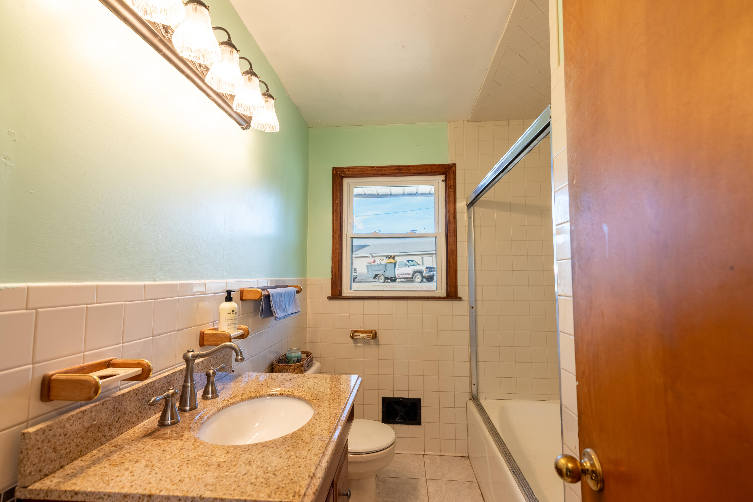 1079 Mountain Valley Road Vinton, VA 24179 - Photo 16 of 29 a bathroom with a sink and a mirror