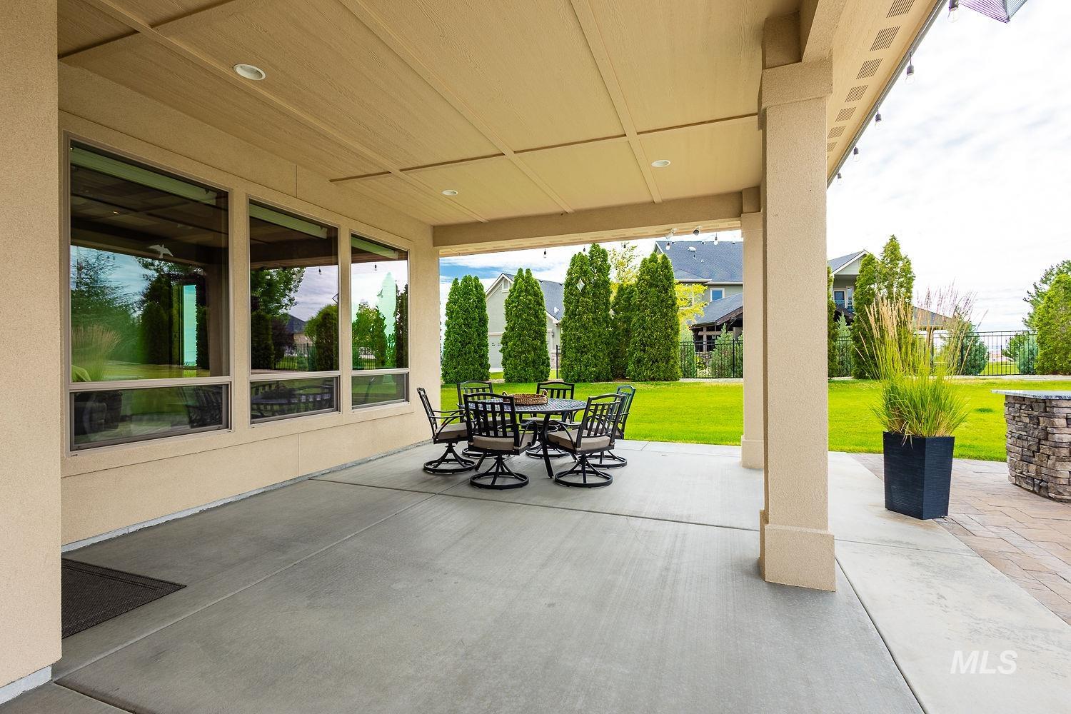 8077 Star Pass Ridge Road Nampa, ID 83686 - Photo 8 of 37 Covered patio featuring a concrete slab, recessed lighting, and a stucco exterior