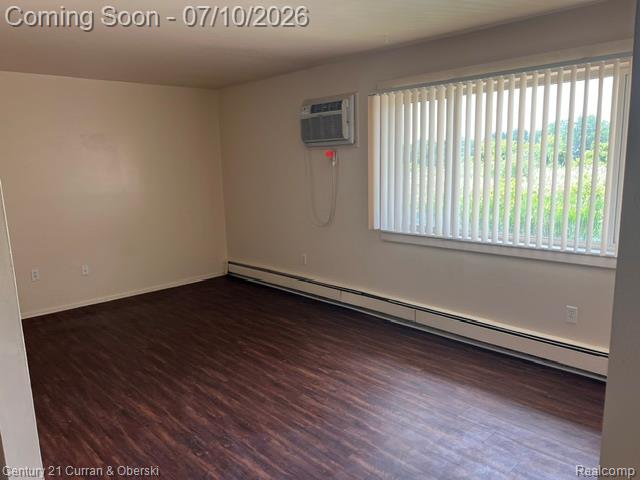 14682 Middle Gibraltar Road, Unit 24 Rockwood, MI 48173 - Photo 4 of 21 Living space featuring wood-finish flooring and light-toned walls