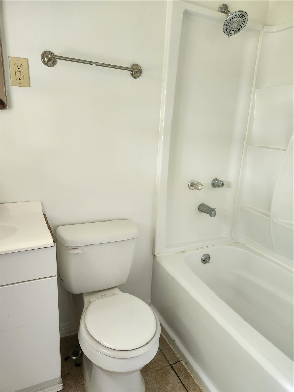 1400 Dyer Avenue Rosenberg, TX 77471 - Photo 14 of 20 a white toilet sitting next to a bath tub
