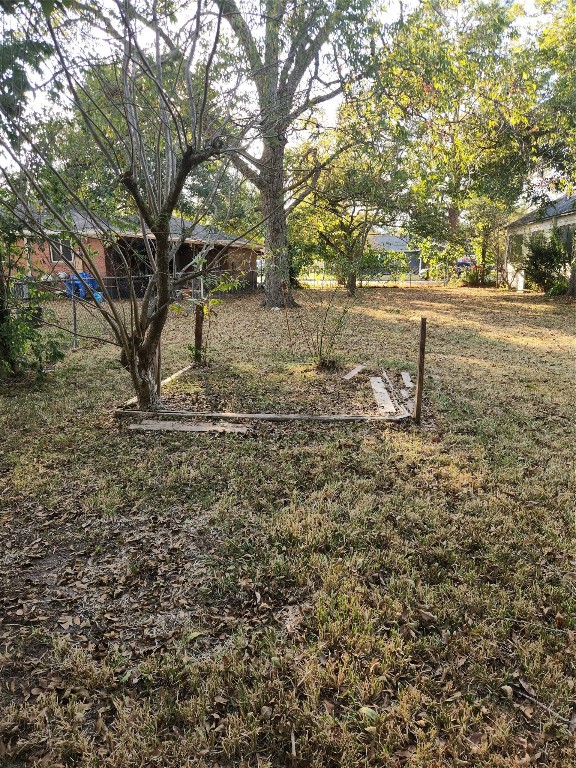 1400 Dyer Avenue Rosenberg, TX 77471 - Photo 20 of 20 a backyard of a house with lots of green space