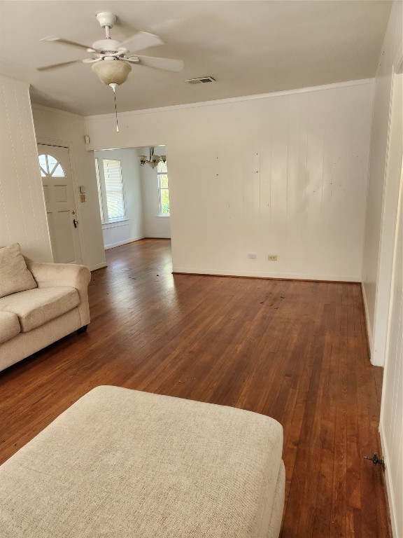 1400 Dyer Avenue Rosenberg, TX 77471 - Photo 6 of 20 a view of a livingroom with a ceiling fan and wooden floor