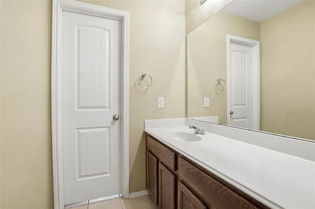 a sink with a mirror