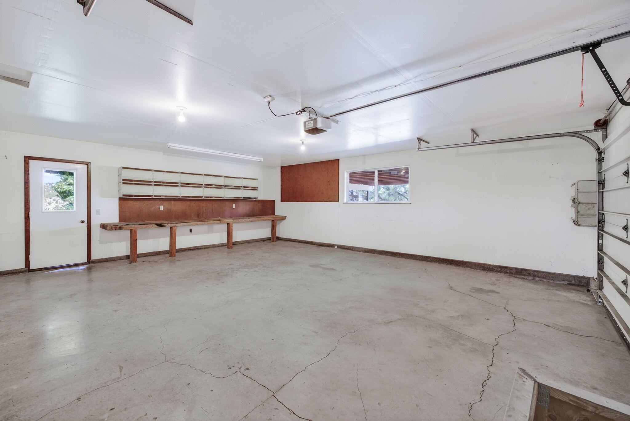 951 Southeast Rancho Lane Madras, OR 97741 - Photo 18 of 48 Attached 2-Car Garage w/ Workbench