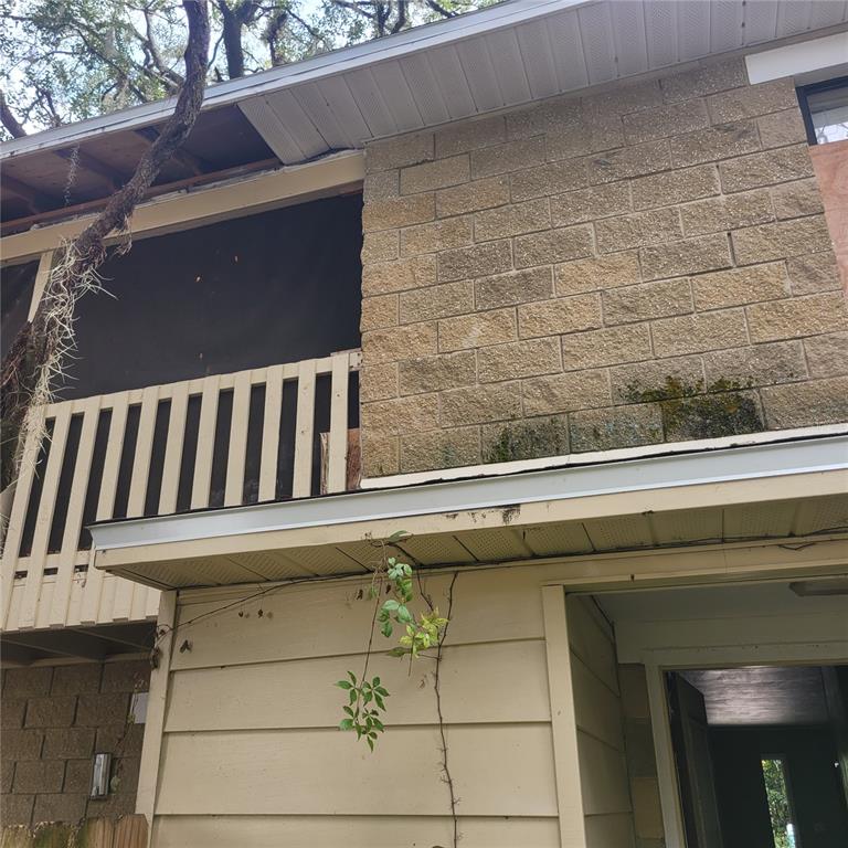 2224 Southwest 39 Drive Gainesville, FL 32607 - Photo 5 of 11 a close view of sink and a mirror