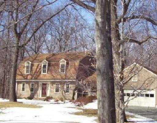 25 Rock Ridge Road Shelton, CT 06484 - Photo 1 of 1 a front view of a residential apartment building with a yard