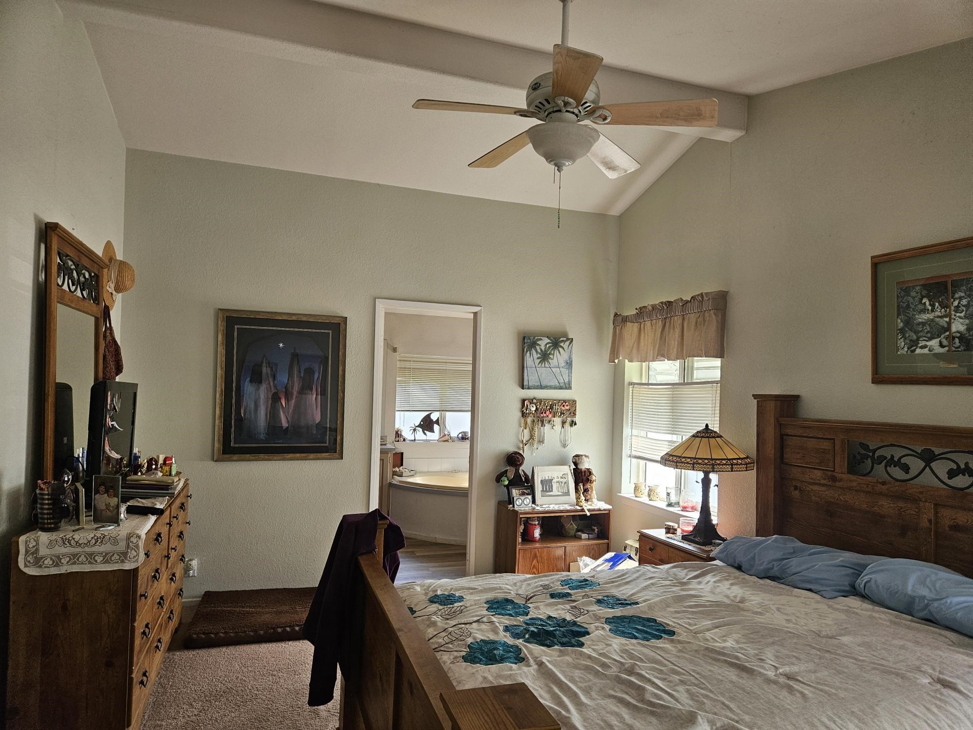 435 32 Road, Unit 424 Clifton, CO 81520 - Photo 17 of 21 a bedroom with furniture and a flat screen tv