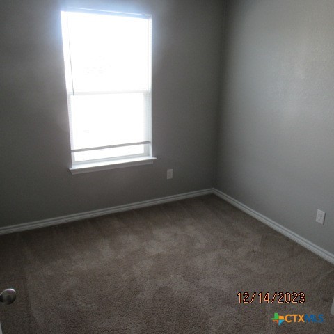1714 Risen Star Lane, Unit B Copperas Cove, TX 76522 - Photo 11 of 12 an empty room with a window