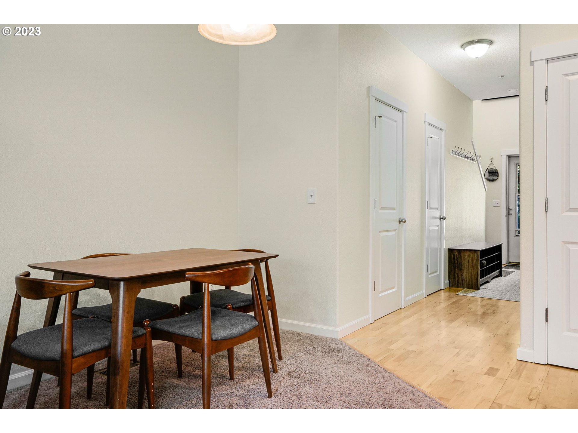 14930 Southwest Conor Circle Beaverton, OR 97006 - Photo 11 of 29 a view of dining room and wooden floor