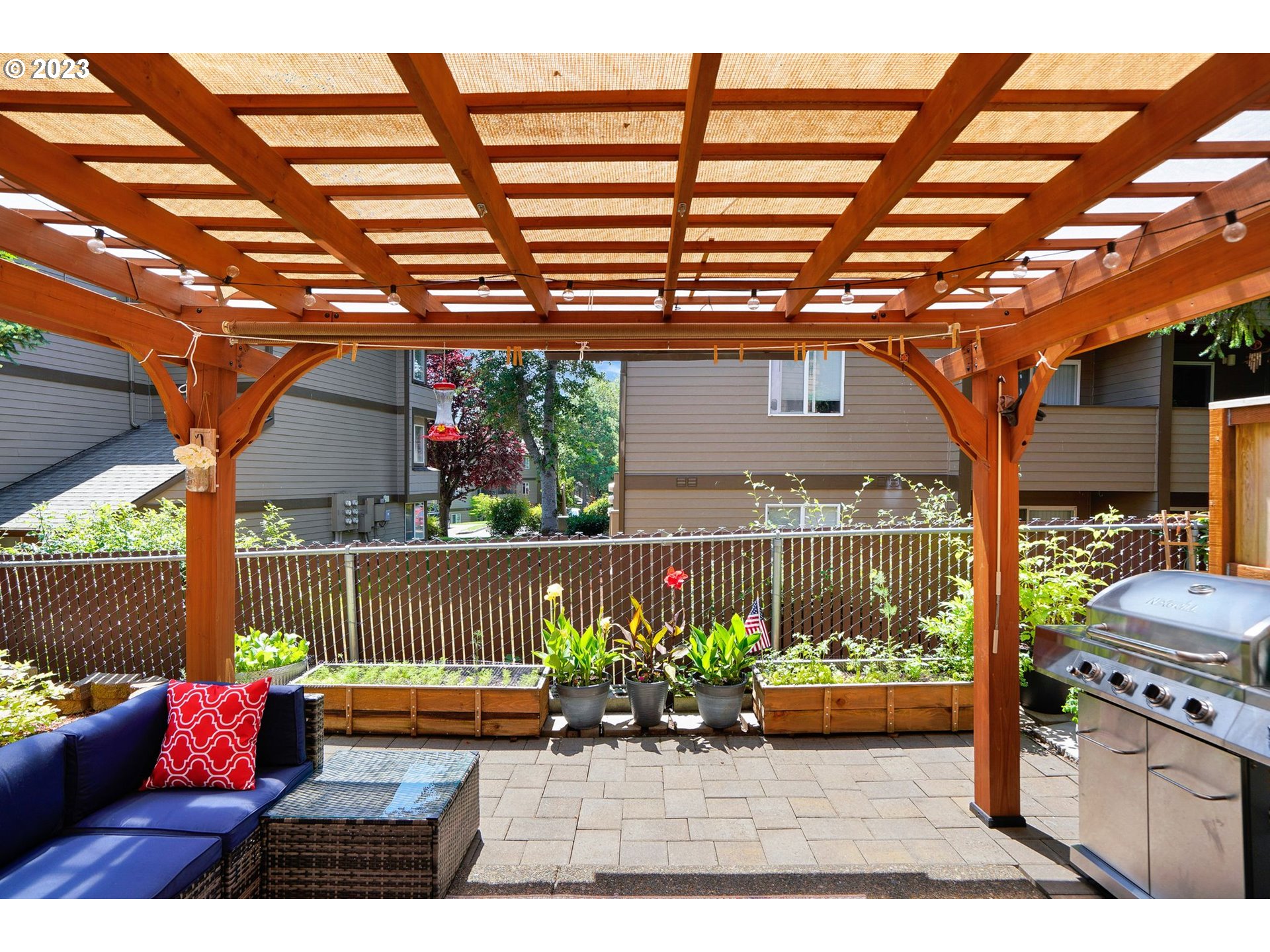 14930 Southwest Conor Circle Beaverton, OR 97006 - Photo 22 of 29 a view of a porch with furniture
