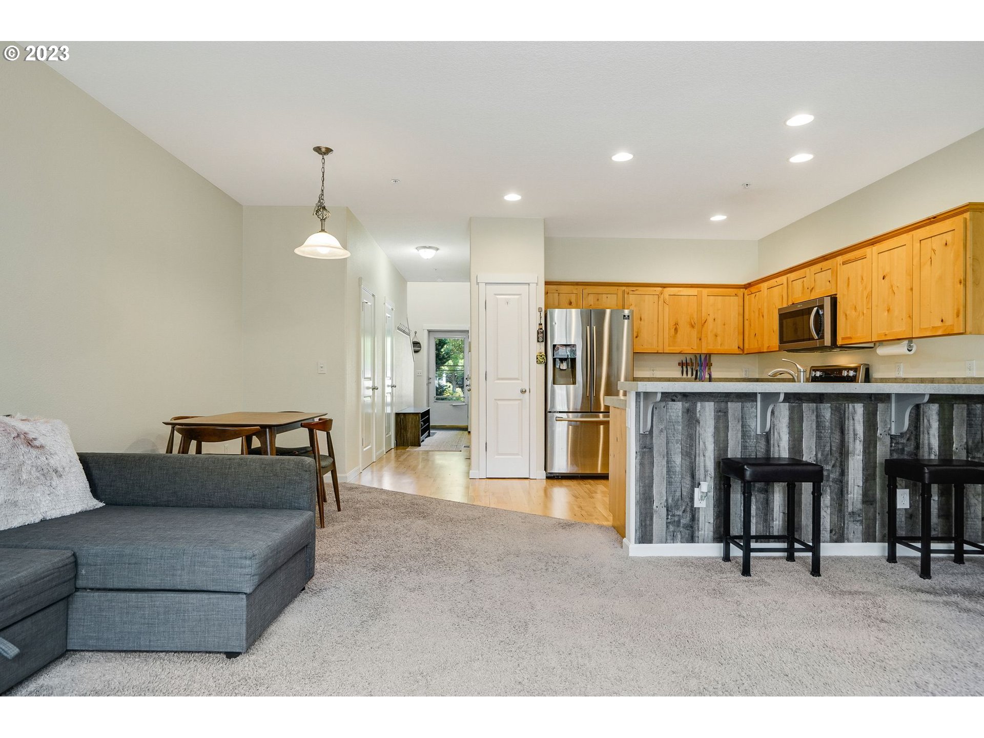 14930 Southwest Conor Circle Beaverton, OR 97006 - Photo 10 of 29 a living room with furniture and kitchen view