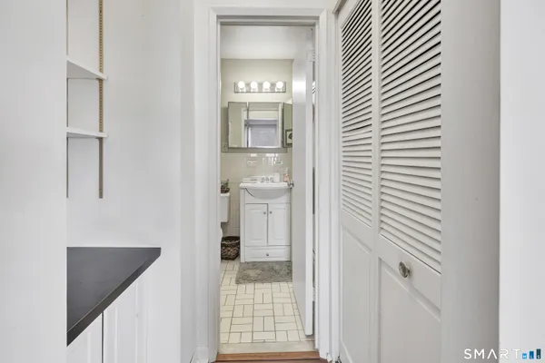 a bathroom with a toilet and a sink