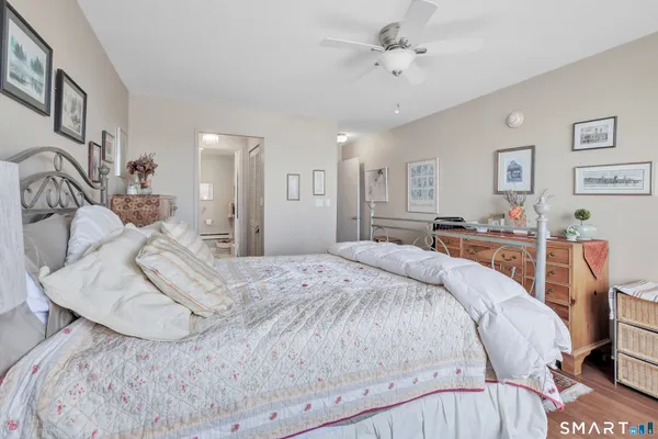 a bed room with a bed and a walk in closet