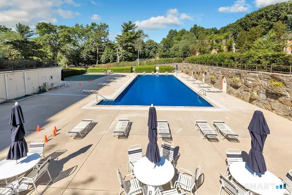 a view of outdoor space yard swimming pool and green space
