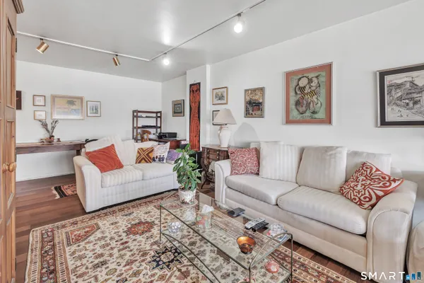 a living room with furniture and a couch
