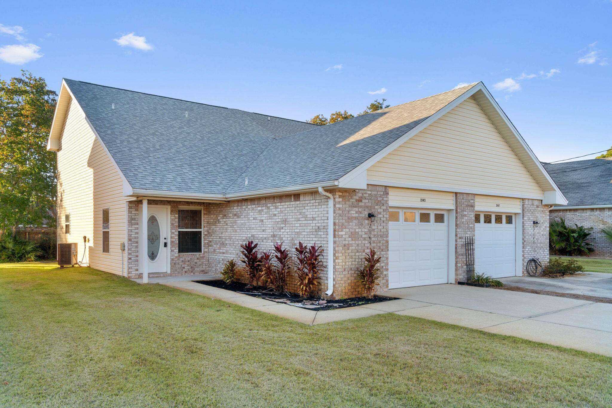 a view of a house with tub and chairs