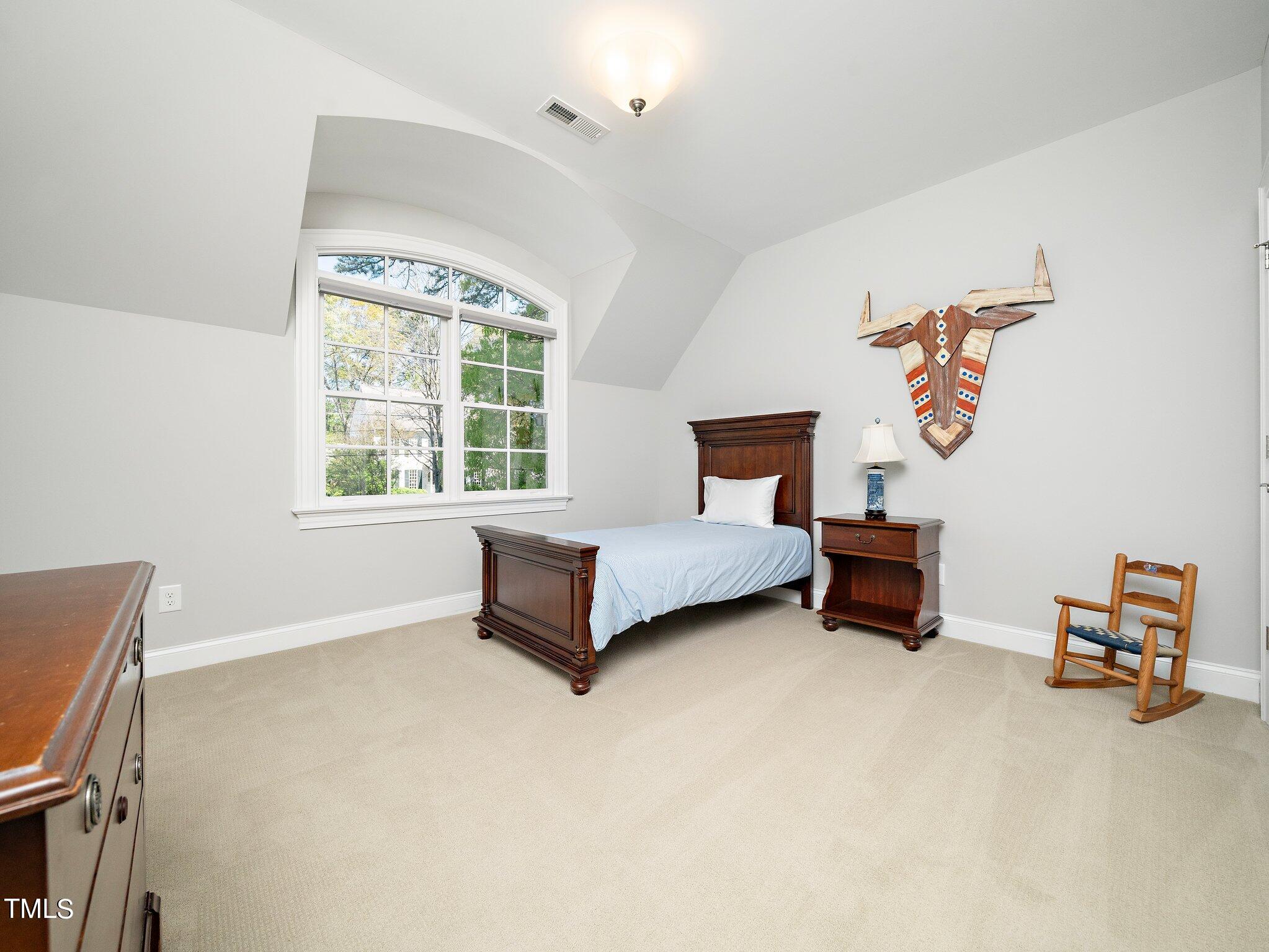 3311 Churchill Road Raleigh, NC 27607 - Photo 13 of 15 a bedroom with furniture and a window