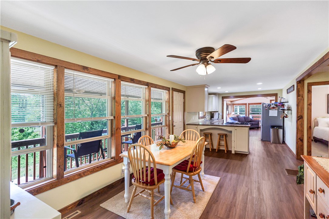 110 Lakeshore Lane Seneca, SC 29678 - Photo 12 of 50 This inviting dining area features ample natural light, perfect for everyday meals or entertaining.