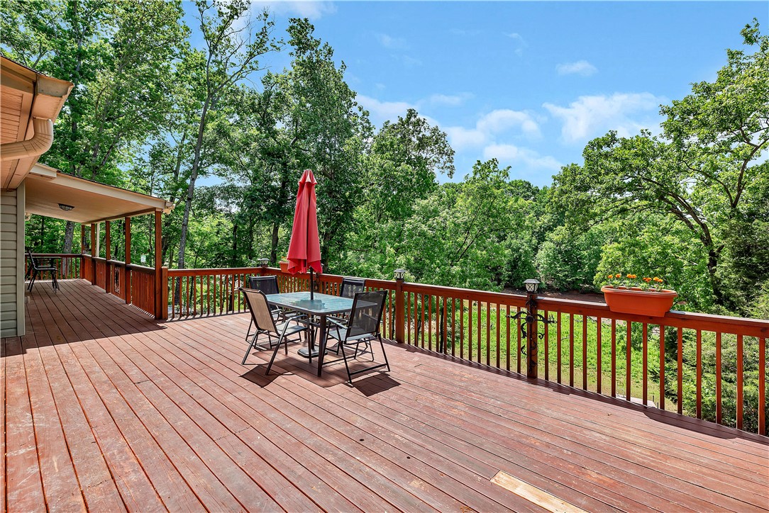 110 Lakeshore Lane Seneca, SC 29678 - Photo 23 of 50 This spacious deck offers tranquil views, perfect for outdoor living and entertaining.