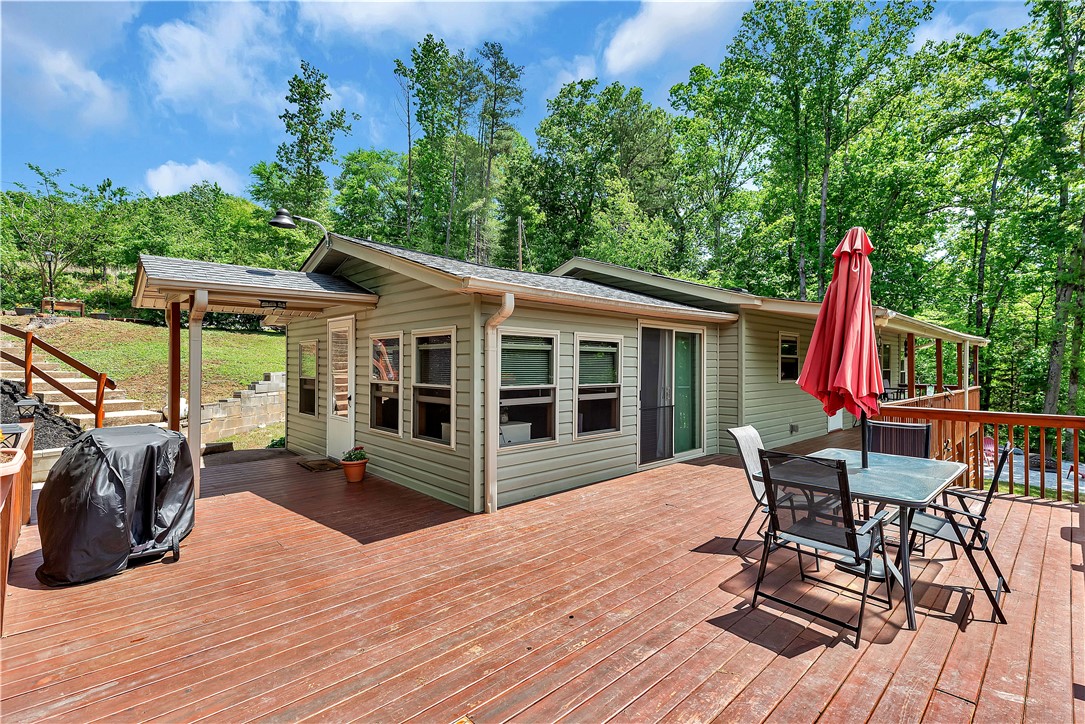 110 Lakeshore Lane Seneca, SC 29678 - Photo 41 of 50 This inviting home features a spacious wood deck perfect for outdoor gatherings.