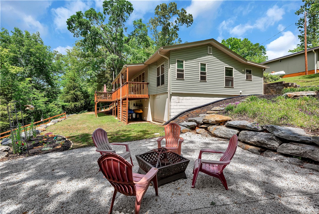 110 Lakeshore Lane Seneca, SC 29678 - Photo 45 of 50 This residence features a deck and a backyard, perfect for outdoor enjoyment.
